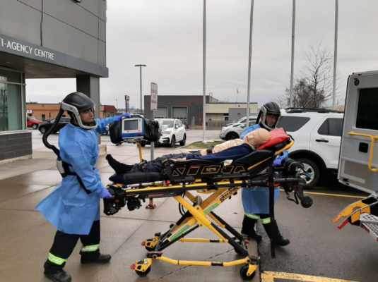 Paramedics with the city’s infectious disease unit will wear powered air-purifying respirators (PAPR) as part of their PPE gear when making COVID-19 calls across Hamilton.
