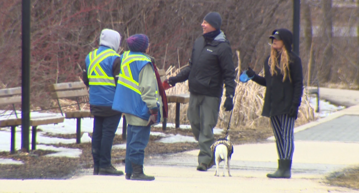 Community Service Ambassadors talking to people at Assiniboine Park on Saturday, April 11th.