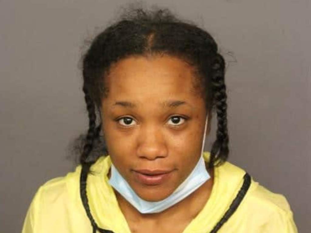 Elizabeth Daniels, 29, has been charged with theft from an at-risk person and identity theft after being accused of stealing from an elderly woman in her care, who died of COVID-19.