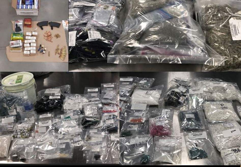 A 34-year-old man has been charged in connection with more than $750,000 worth of drugs and 11 guns were seized by Calgary police.