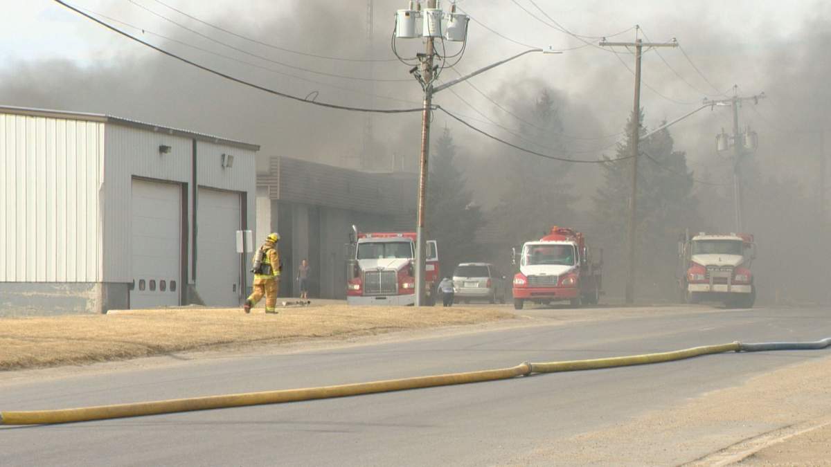 Firefighters responded to the scene on Sunday. LORAAS Disposal trucks are parked outside the business on McLeod Street.