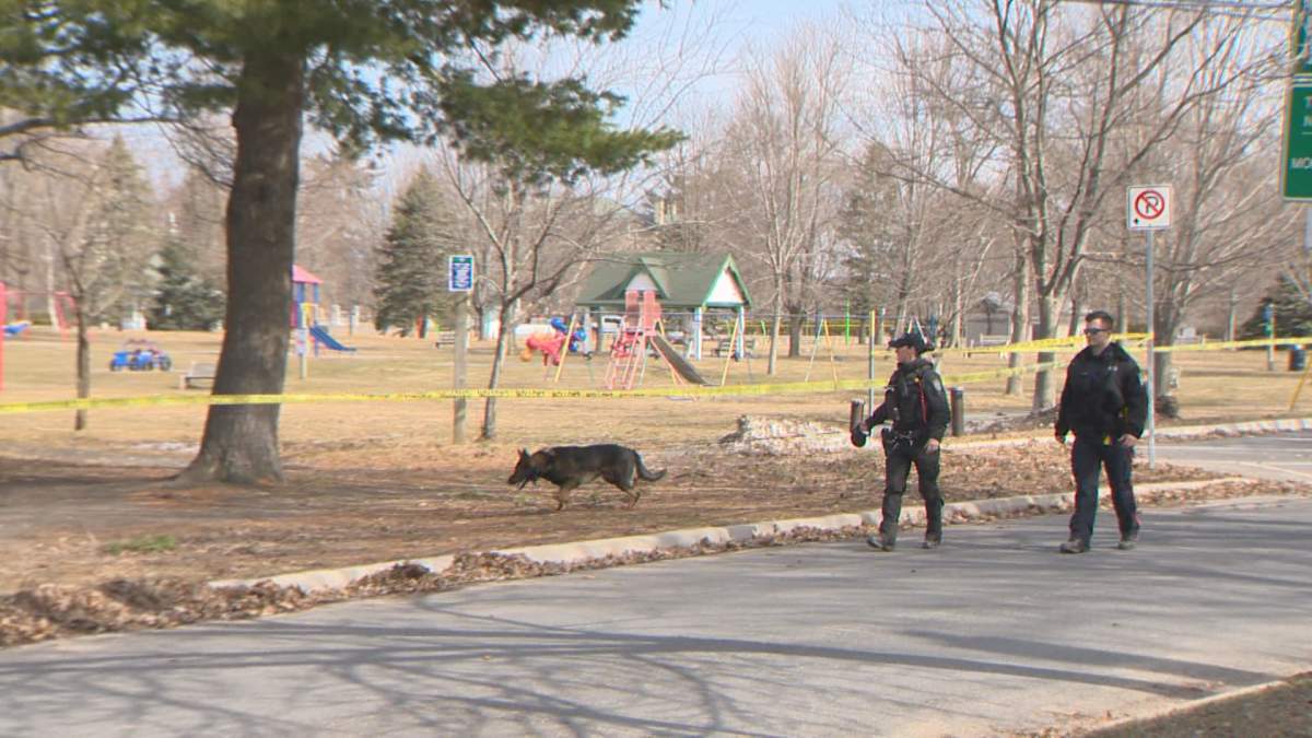 Investigators attend the scene of a homicide in Fredericton on Wednesday, April 15, 2020.  