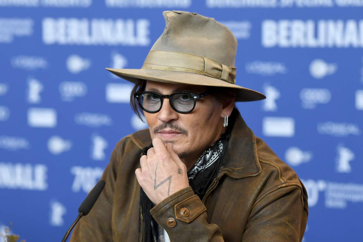 Actor Johnny Depp attends the press conference for Minamata during the 70th Berlin International Film Festival at the Grand Hyatt Berlin.