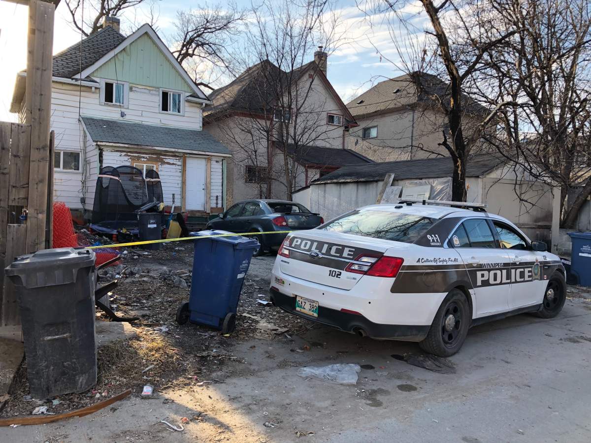 Police tape surrounds a Victor Street home where Noah Soloman Nigussie, 23, was shot and killed in April 2020.