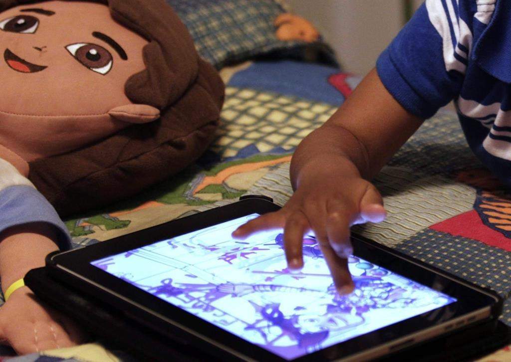 Kid using iPad