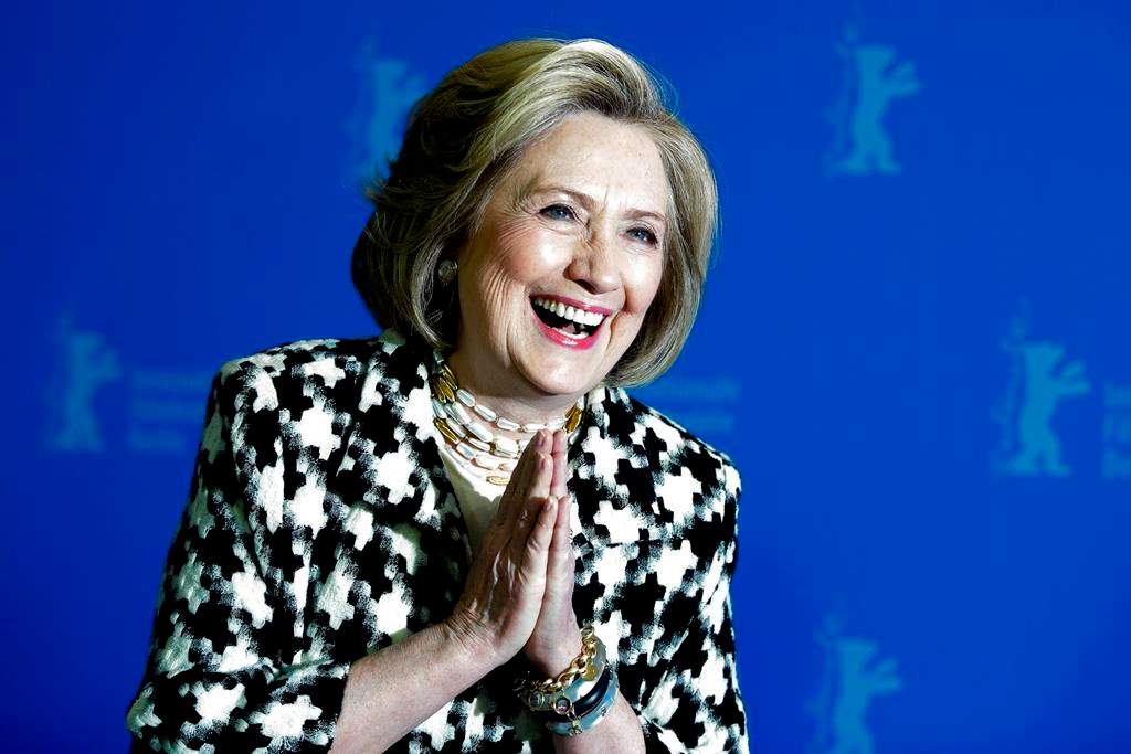 In this Feb. 2020 photo, Former US Secretary of State, Hillary Clinton, poses for the photographers during a photo-call for the film 'Hillary' ' during the 70th International Film Festival Berlin, Berlinale in Berlin, Germany.