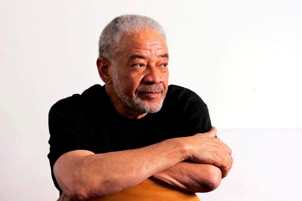 In this June 21, 2006 file photo, singer-songwriter Bill Withers poses in his office in Beverly Hills, Calif. (AP Photo/Reed Saxon, File)