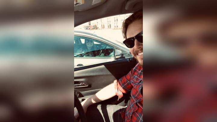 “We decided we’re going to have a drive-thru date,” said Pat Dubois, left. The Saskatoon radio host has been meeting his girlfriend of nearly two years for physically-distant parking lot dates during the COVID-19 pandemic.