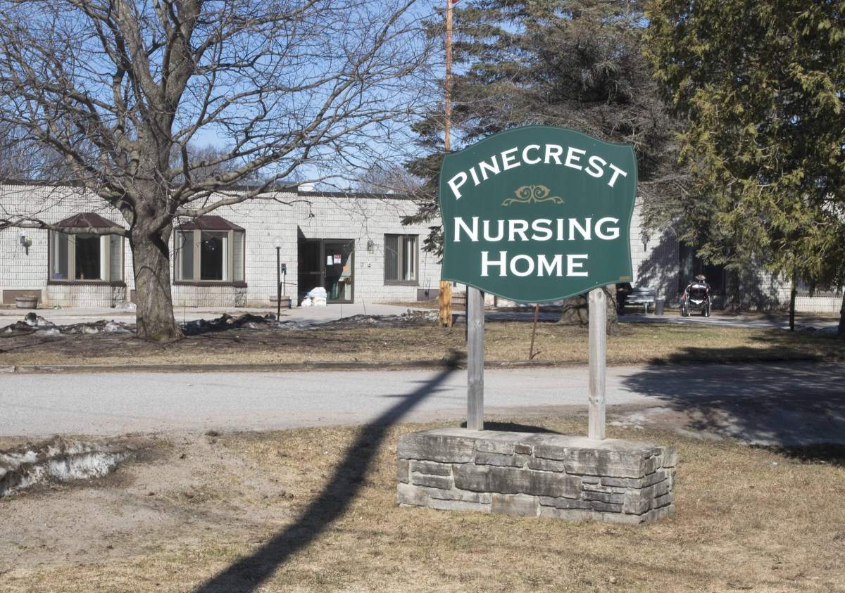A sign outside of Pinecrest Nursing Home in Bobcaygeon Ont. is seen on Friday, March 27, 2020. THE CANADIAN PRESS/Fred Thornhill.