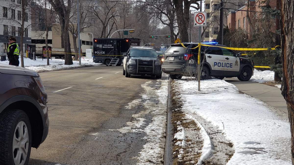 An Edmonton police vehicle "briefly" connected with a suspect during an arrest at 100 Avenue and 110 Street on Saturday afternoon.