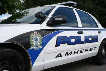 The Amherst Police Department said three staff members were charged after a 13-month investigation.