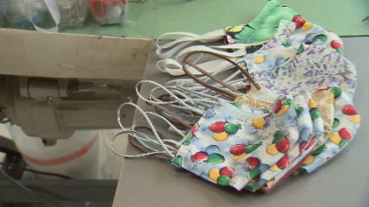 The Renwick Family make the masks out of donated elastics, cotton and fabric.