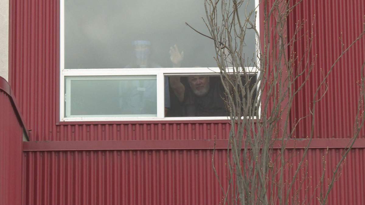 Residents and staff watched Tuesday’s street-side concert from their windows and balconies.
