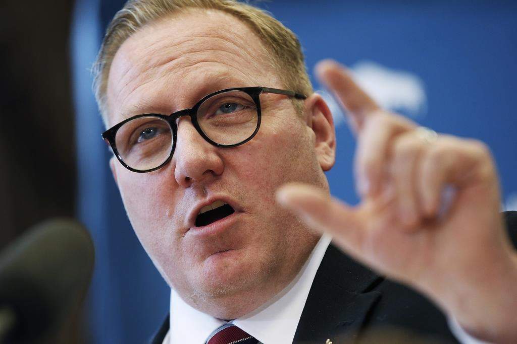 Manitoba Finance Minister Scott Fielding speaks to media at a press conference before the provincial budget is read at the Manitoba Legislature in Winnipeg, Wednesday, March 11, 2020. Manitobans will soon have a non-binary gender option on birth certificates. THE CANADIAN PRESS/John Woods.
