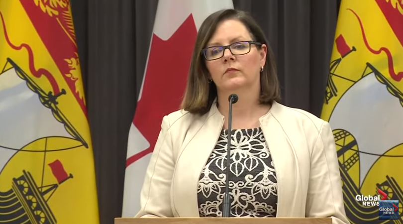 Dr. Jennifer Russell speaks at a press briefing.