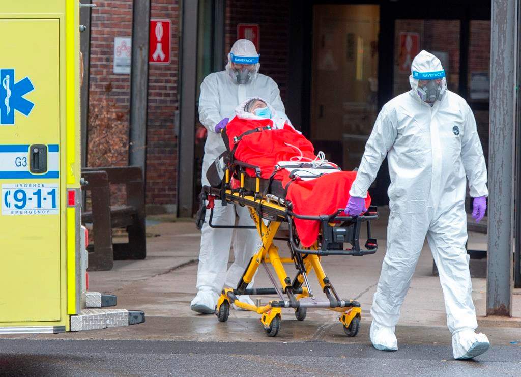 A resident is transported from the CHSLD Lasalle seniors residence Tuesday April 21, 2020 in Montreal.