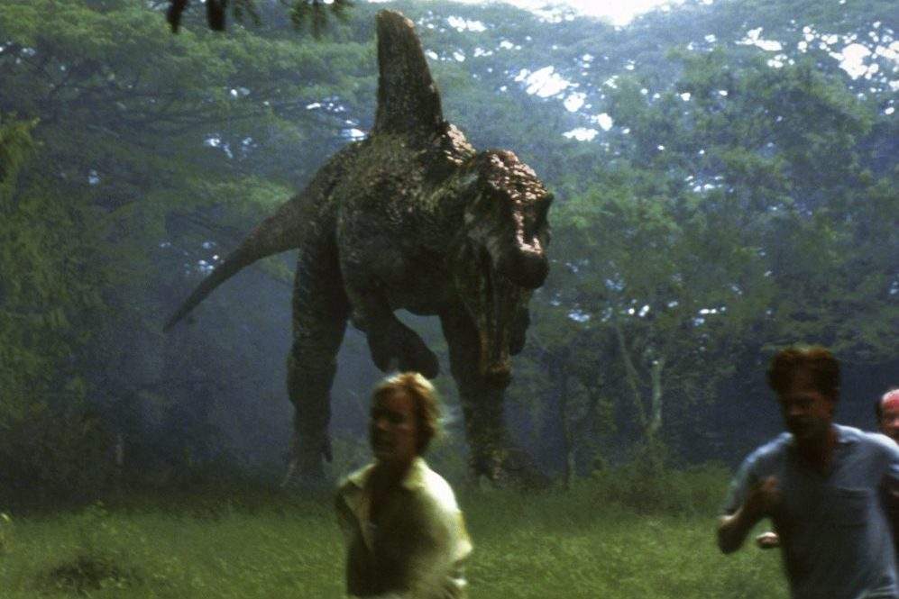 A spinosaurus stalks Tea Leoni and William H. Macy in this image from 'Jurassic Park III.'.