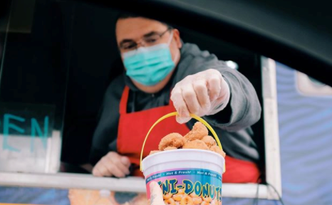 Calgary Mini Donuts participates in the YYCFoodTruck drive-thru.