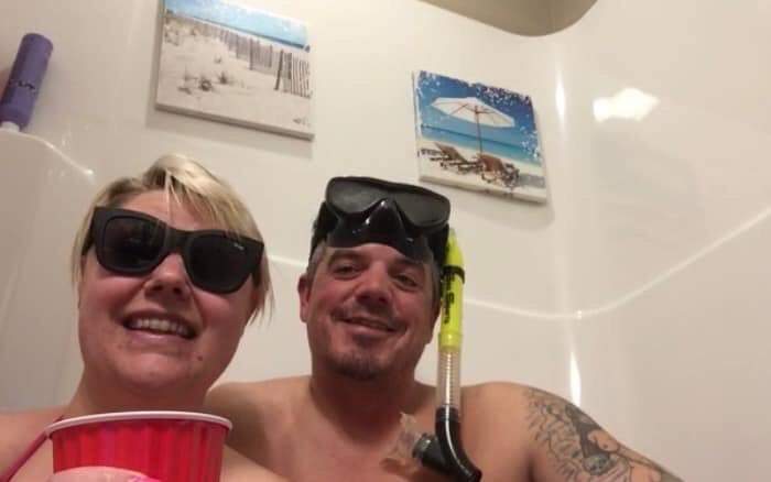 “I don’t know if outside … of self-isolation, we would have sat for hours and played games,” said newlywed Amanda Watson, left, with husband Billy in Lloydminster, Alta., on her birthday April 4, 2020.