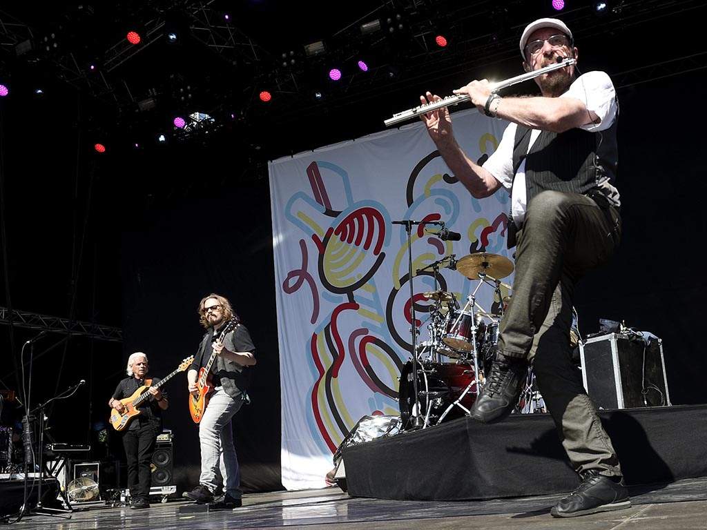 Ian Anderson, right, of British band Jethro Tull performs in Pori, Finland in 2017.