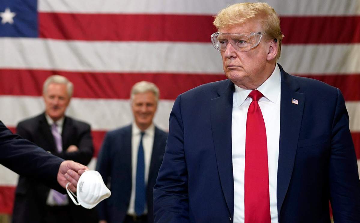 President Donald Trump participates in a tour of a Honeywell International plant that manufactures personal protective equipment, Tuesday, May 5, 2020, in Phoenix.
