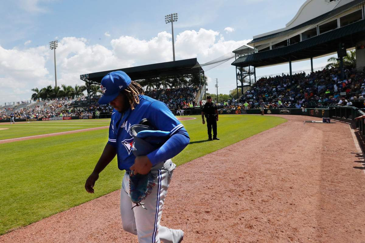Toronto Blue Jays third baseman Vladimir Guerrero Jr. walks off the field during a spring training baseball game against the Pittsburgh Pirates, Thursday, March 12, 2020, in Bradenton, Fla.