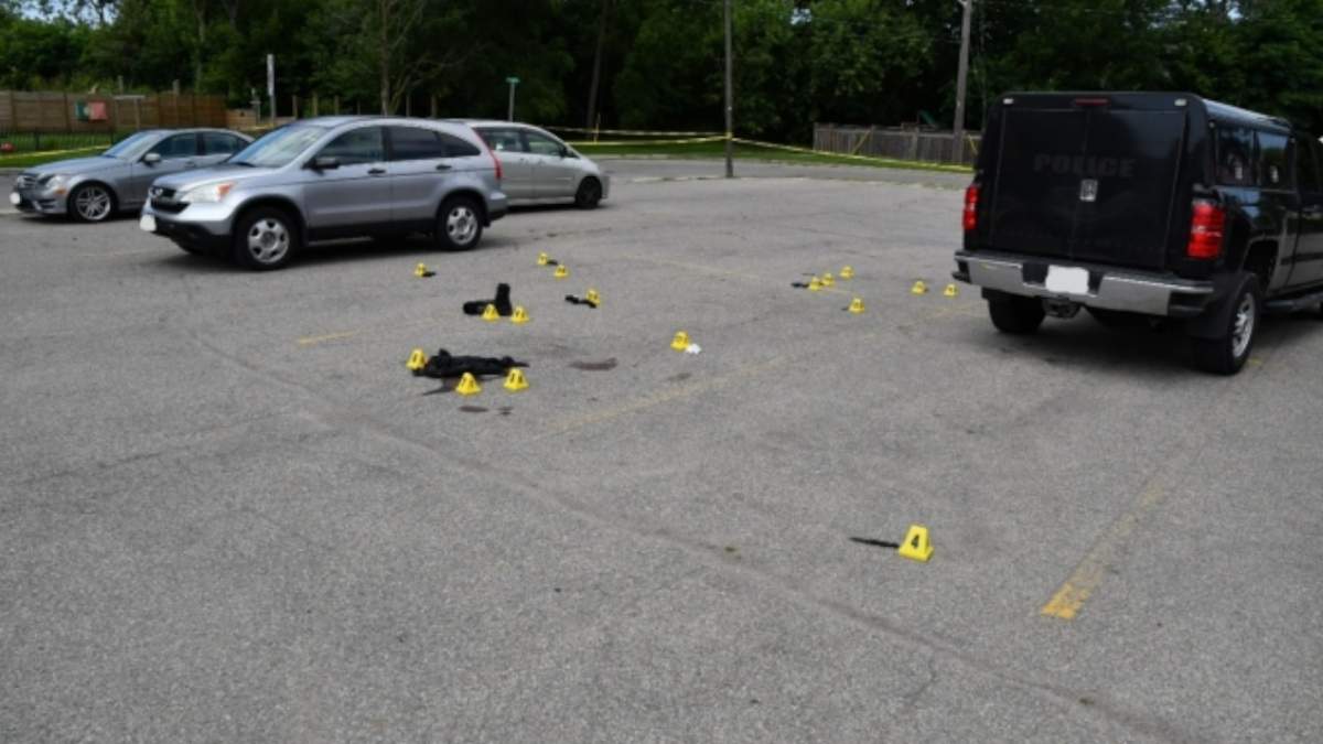 SIU investigation photos show the parking lot where a 2019 police-involved shooting occurred. Cartridge cases, knives, a taser and a complainant’s personal belongings were found at the scene of the incident.