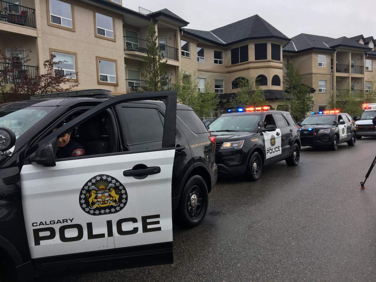 Calgary police drive by Dorothy’s complex.