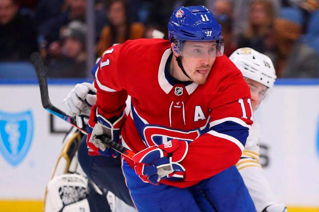 In this file photo, Montreal Canadiens forward Brendan Gallagher (11) skates during the second period of an NHL hockey game against the Buffalo Sabres. The Habs announced they've signed Gallagher to a six-year contract extension. Wednesday, Oct. 14, 2020.