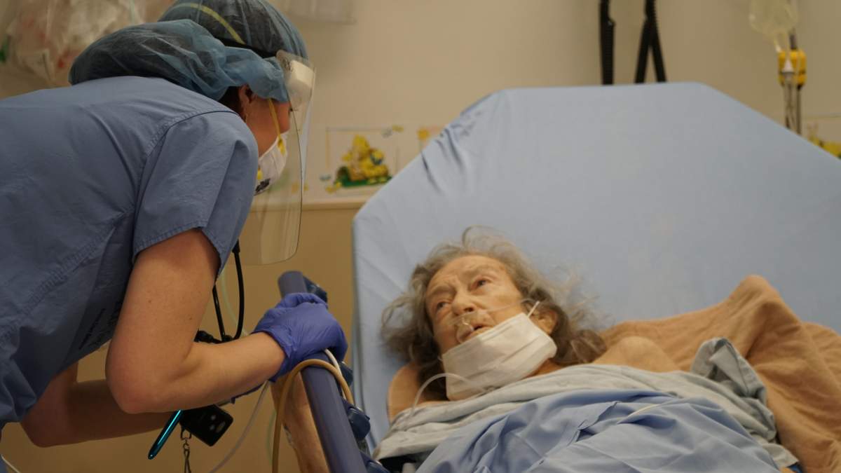 Dr. Tory checks-in on an elderly patient at Humber River Hospital. Doctors discovered she had acute leukaemia.