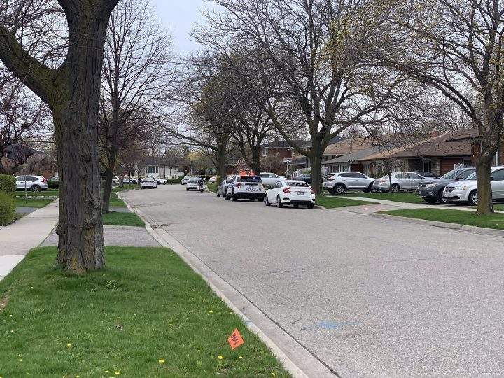 Police at the scene of a triple stabbing in Mississauga on Saturday.