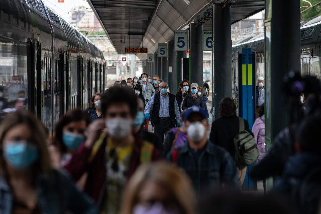 Passengers arrive at Cadorna railway station on May 4, 2020 in Milan, Italy.