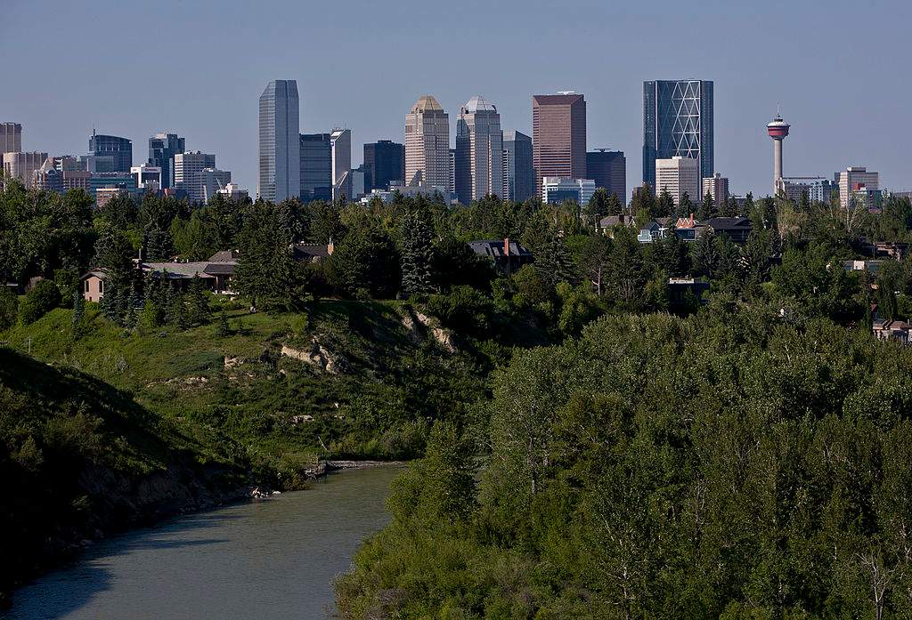 The downtown skyline is viewed from the Elbow River to the south of the city on July 3, 2012 in Calgary, Canada.  