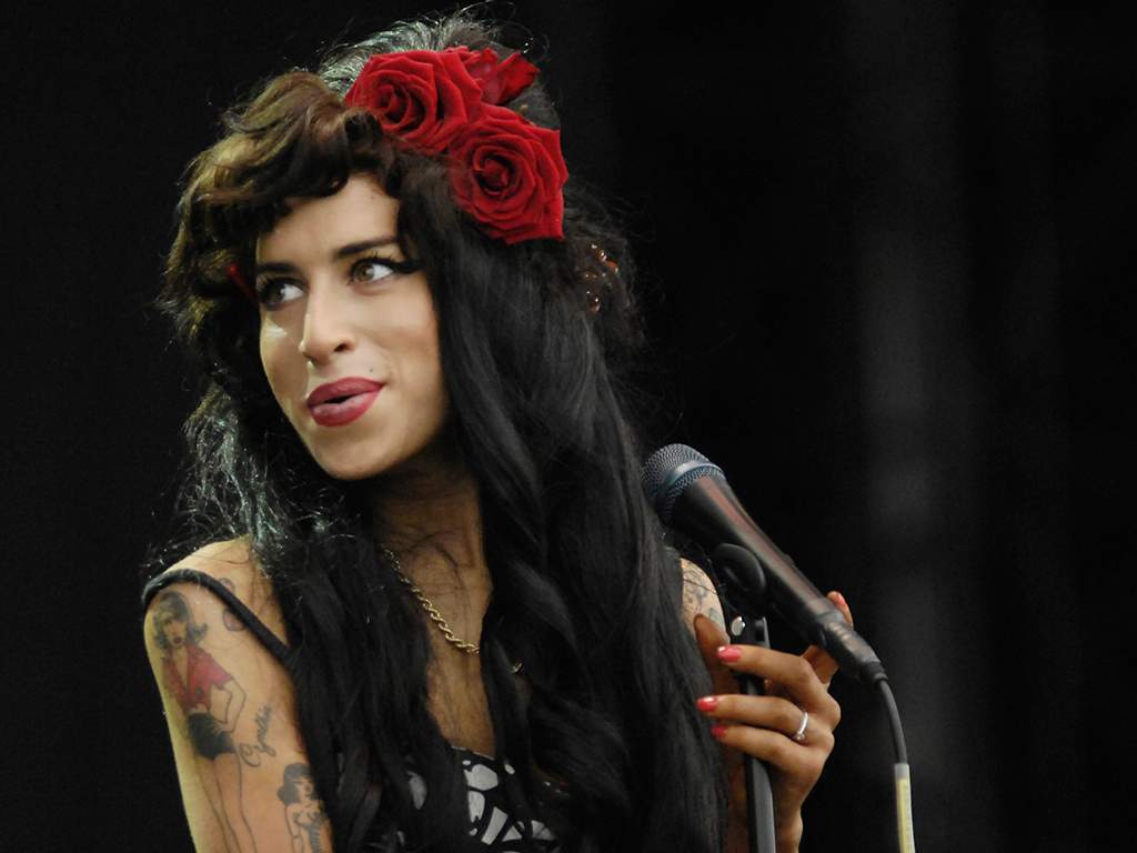Amy Winehouse performing on stage at V Festival on Aug. 16, 2008.