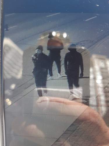 Calgary police are looking to identify three suspects involved in a possibly hate-motivated graffiti attack on the Chinese Consular-General building.