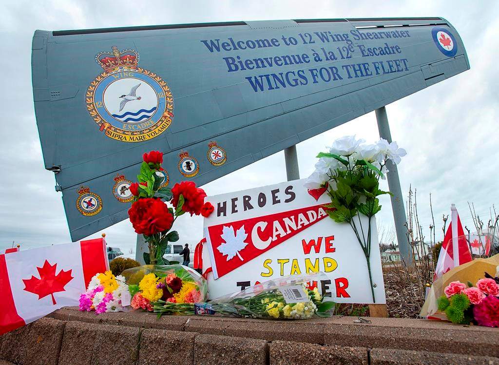 A memorial pays respect to the victims of a military helicopter crash, at 12 Wing Shearwater in Dartmouth, N.S., home of 423 Maritime Helicopter Squadron, on Friday, May 1, 2020. THE CANADIAN PRESS/Andrew Vaughan