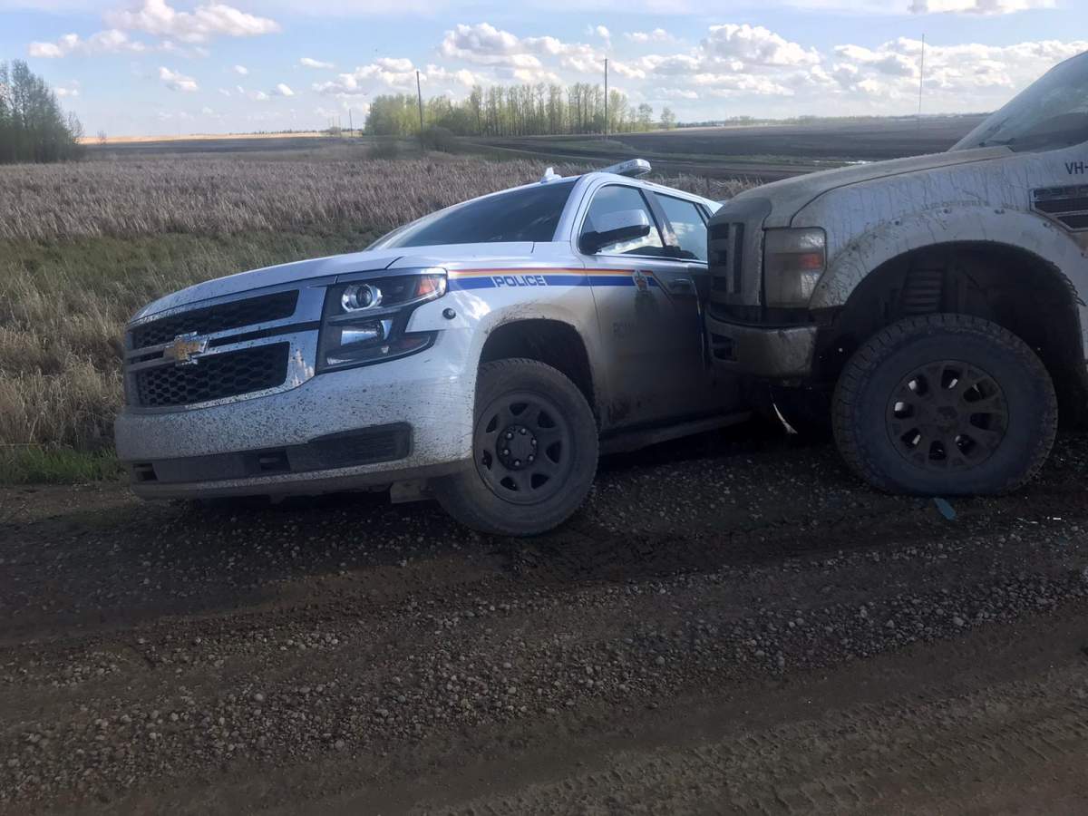 A man is facing several charges after police said one of their vehicles was intentionally rammed on Saturday evening.