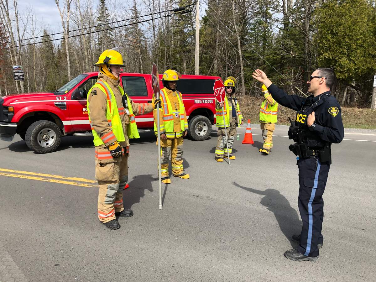 Firefighters and OPP on the crash scene at Hwy. 28 and Northey’s Bay Road near Woodview.