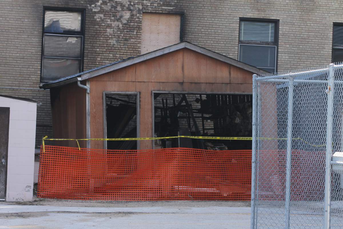 This shed was extensively damaged during a fire Saturday night.