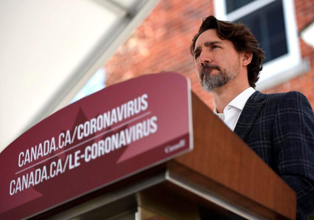 Prime Minister Justin Trudeau speaks during his daily news conference on the COVID-19 pandemic outside his residence at Rideau Cottage in Ottawa, on Sunday, May 3, 2020.