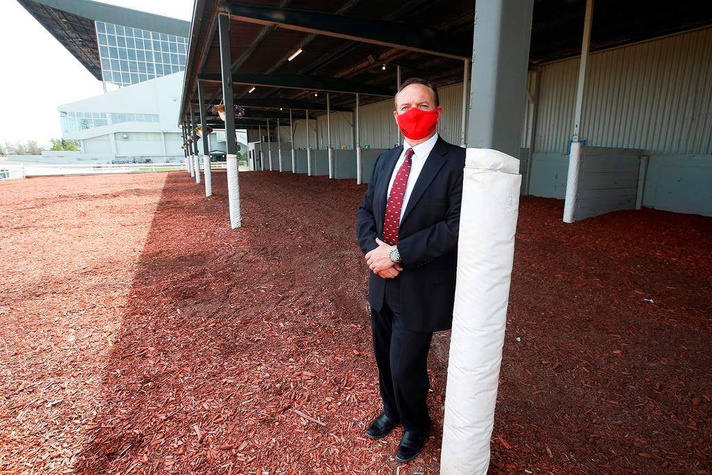 Darren Dunn, chief executive officer, is photographed at the track at Assiniboia Downs in Winnipeg Monday, May 25, 2020. THE CANADIAN PRESS/John Woods.