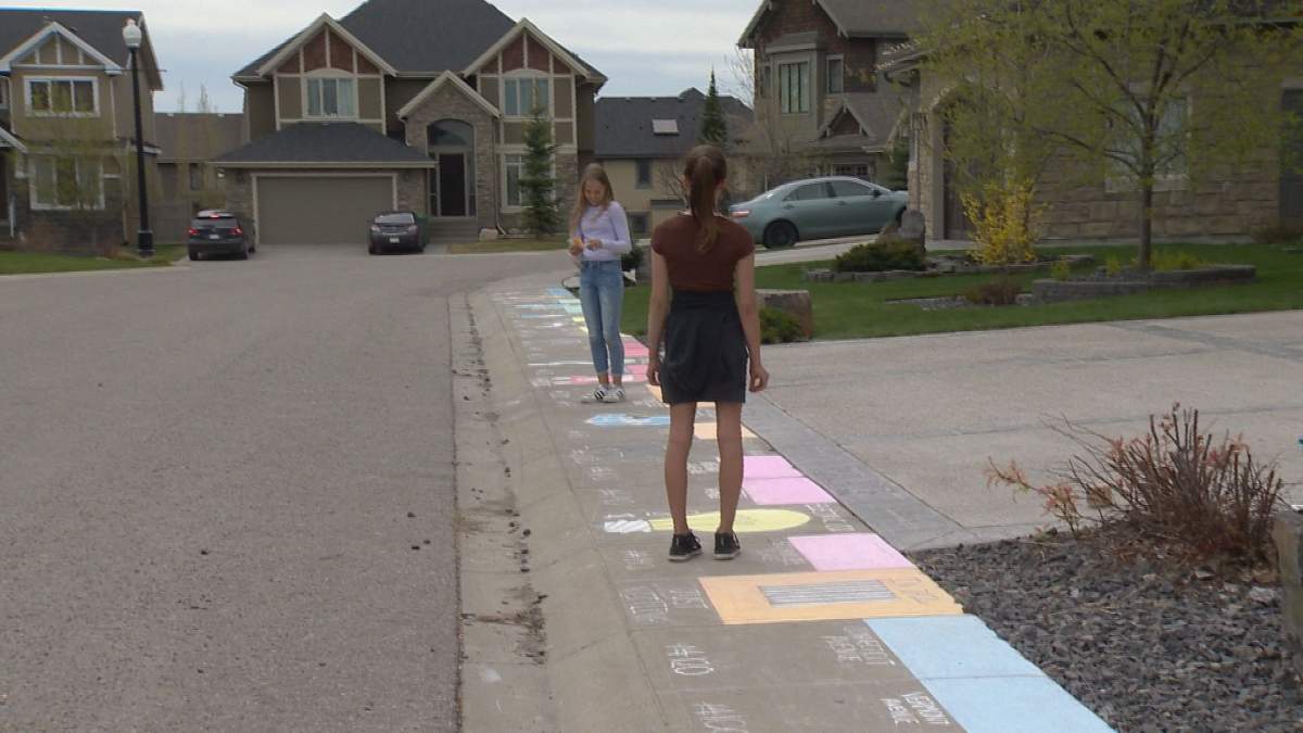 Calgary kids created a sidewalk chalk version of Monopoly.