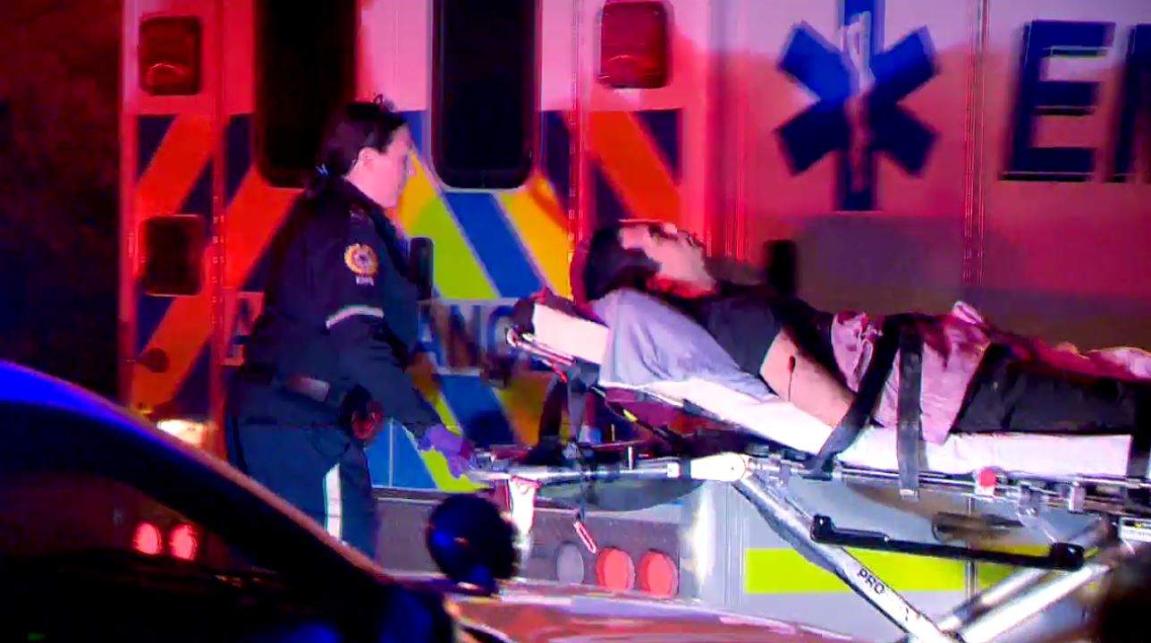 Matthew de Grood on a stretcher.