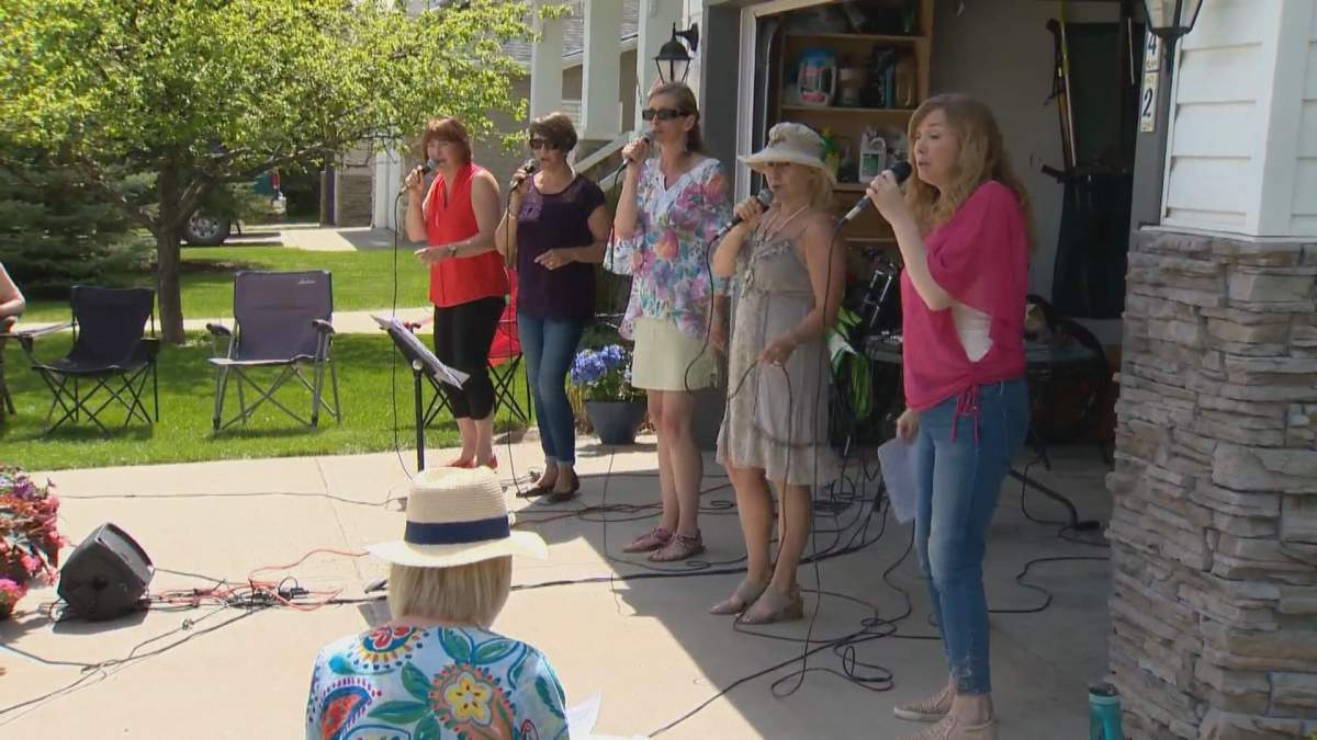 Singers performed in a drive for the food bank in Okotoks, Alta., on Sunday, May 24, 2020.