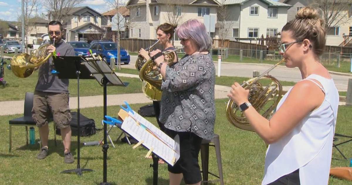 A French horn quartet performed in a music drive for the food bank in Okotoks, Alta., on Sunday, May 24, 2020.