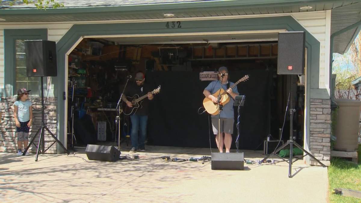 People turned out to a music drive for the food bank in Okotoks, Alta., on Sunday, May 24, 2020.