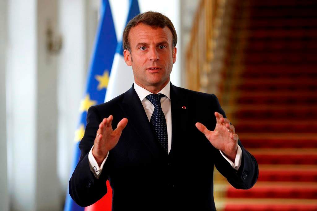 French President Emmanuel Macron speaks after a video-conference summit on vaccination at the Elysee Palace in Paris, Monday, May 4, 2020.
