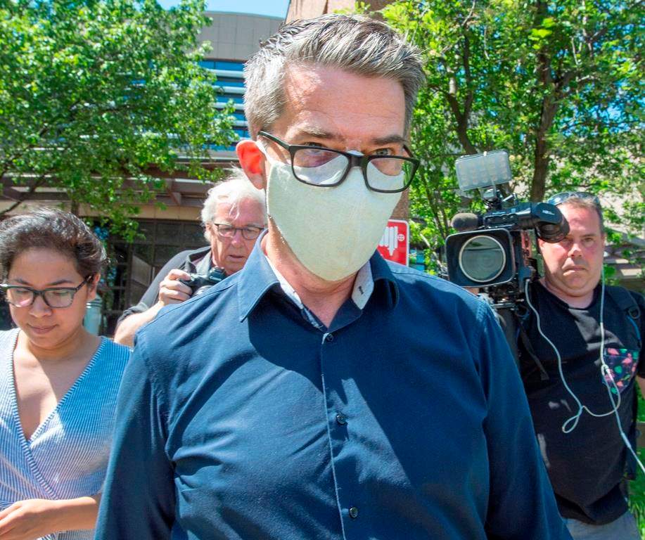 Former Parti Quebecois leader Andre Boisclair leaves the police station on Friday, May 29, 2020 in Montreal.