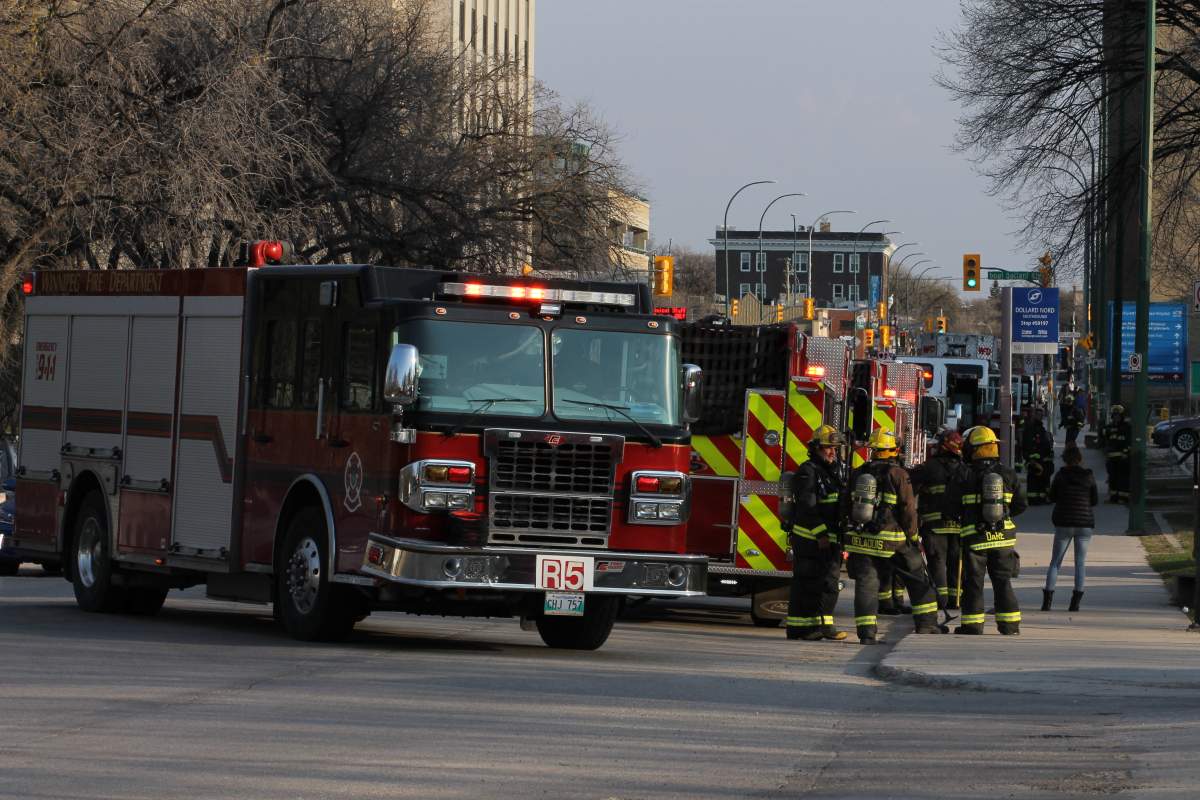 Firefighters remain on standby while additional crews attended a fire.