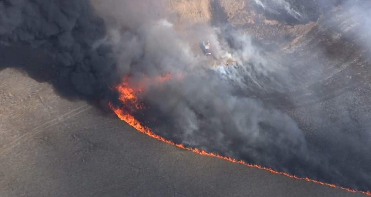 An aerial shot by Global1 as crews from the Calgary Fire Department and Tsuut'ina Nation battle a wildfire in the city's southwest on Friday, May 1, 2020.
